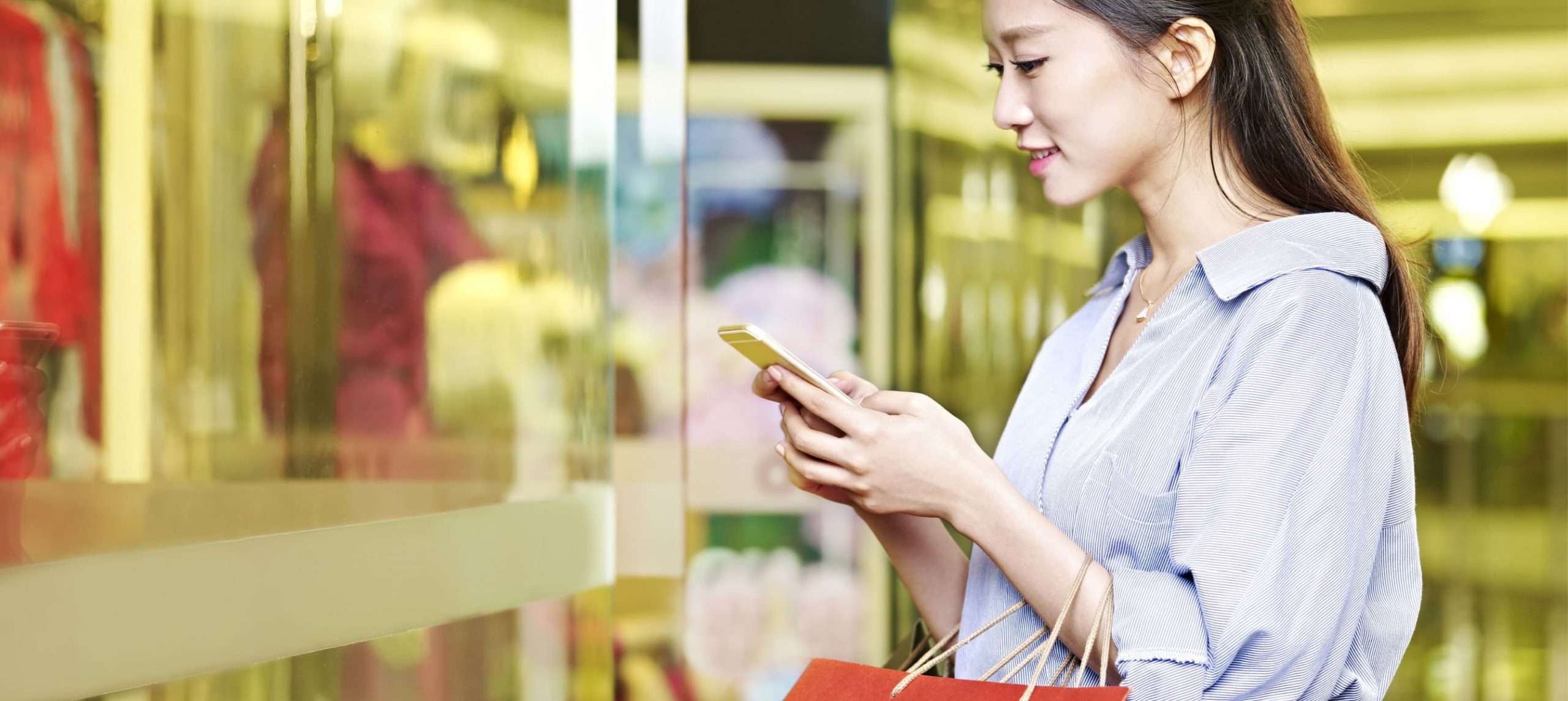 Young asian woman shopping in Singapore.