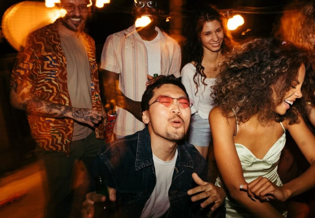 A group of people partying at a club