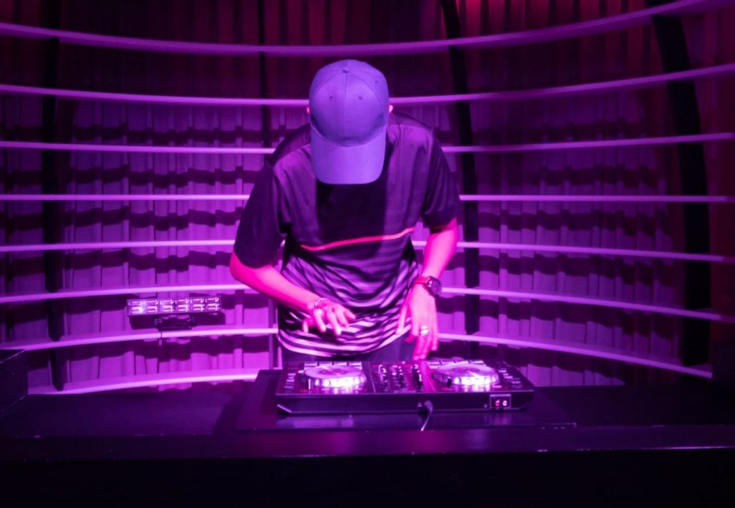 DJ playing songs at a club