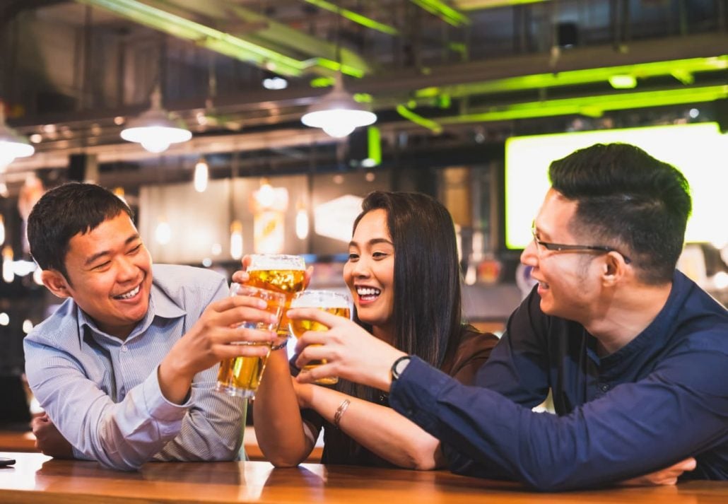 A group of friends having a beer