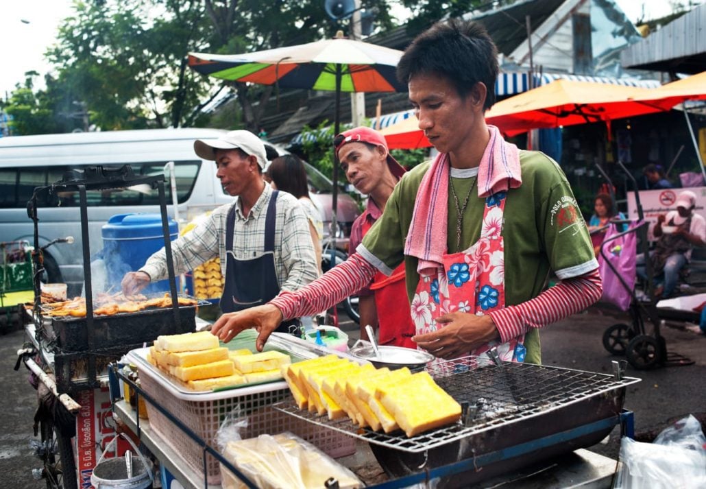 Thai vendor selling bread egg toast dish at Chatuchak market