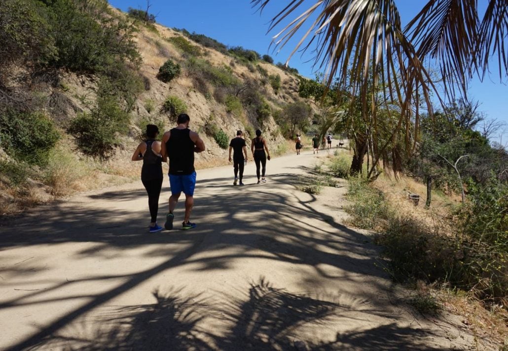People walking along a trail in the Runyon Canyon Park, Los Angeles, California.
