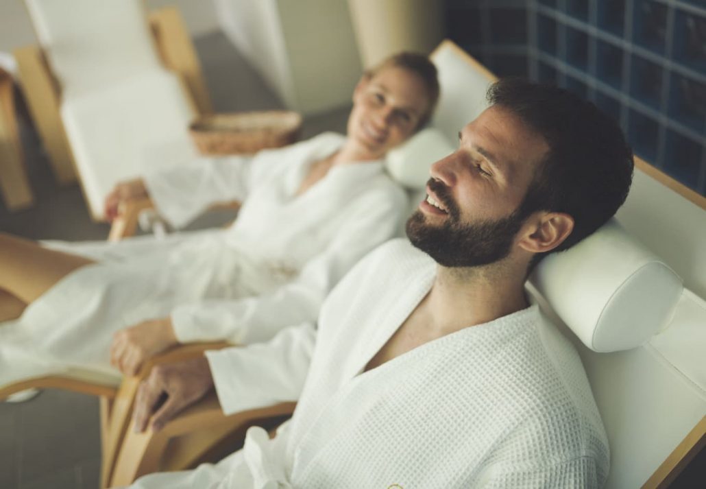 a man and a woman at a spa together