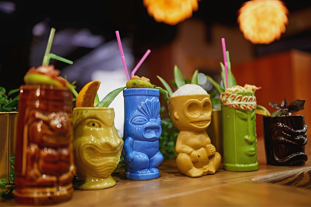 Tiki glasses at a bar