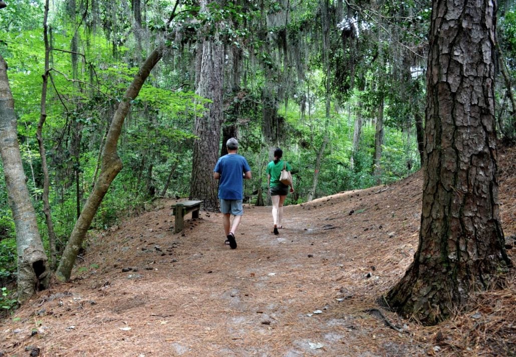 Two people hiking at First Landing State Park, Virginia Beach, Virginia.