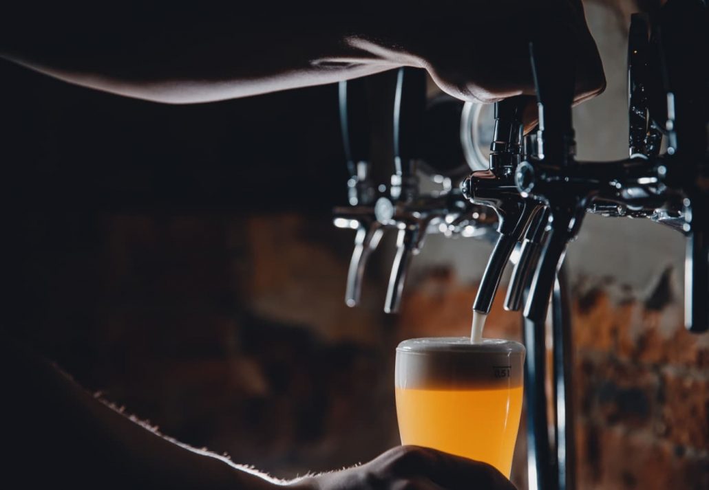 Best pubs in London - Beer on tap in a pub.