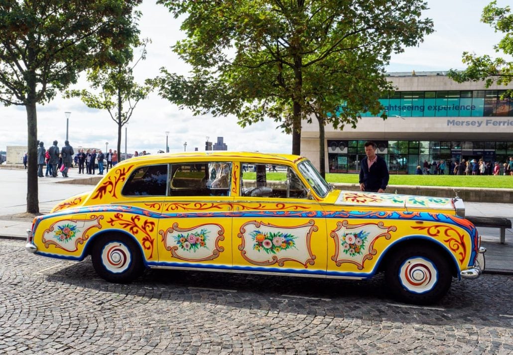 Beatles Tour Liverpool - a colorful old-fashioned car in Liverpool