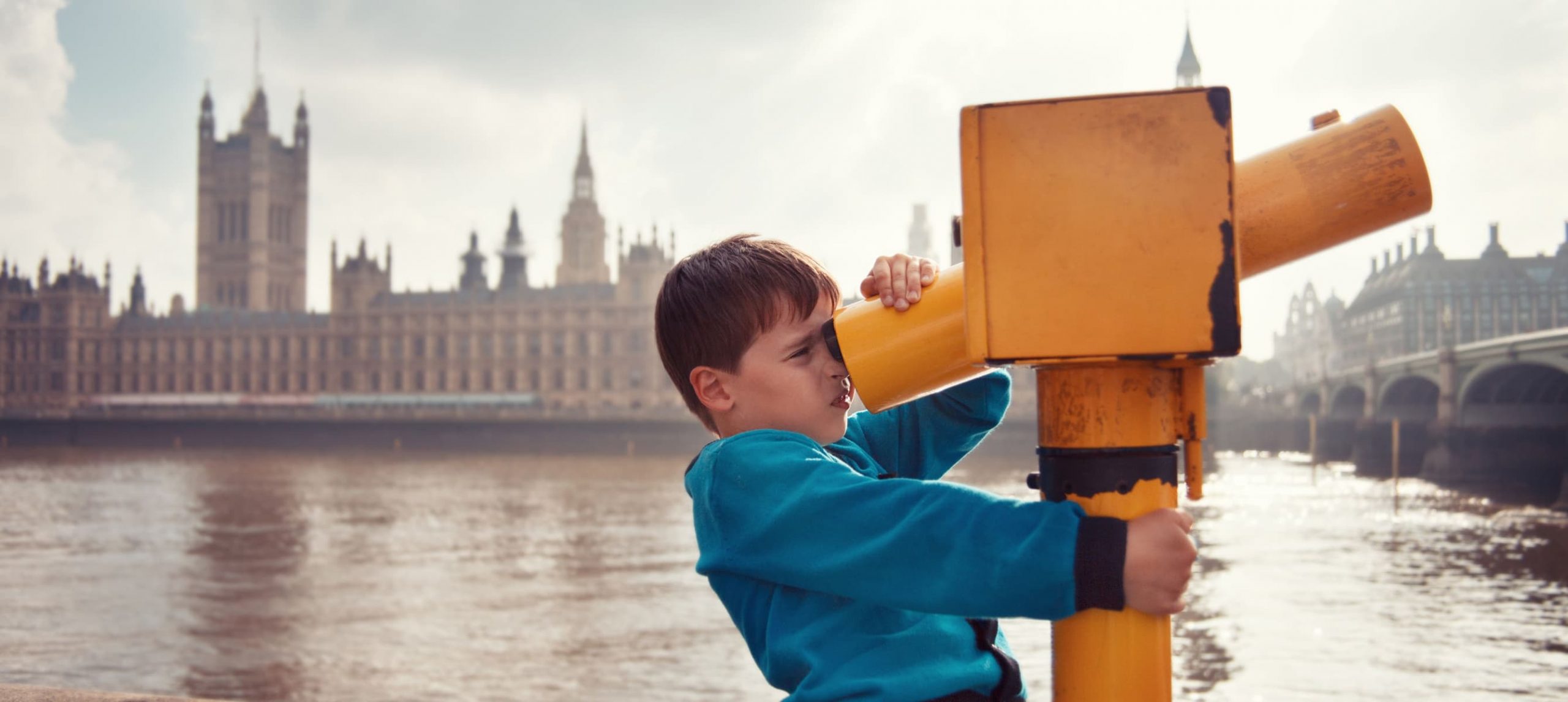 A young boy marveling at the city of London.