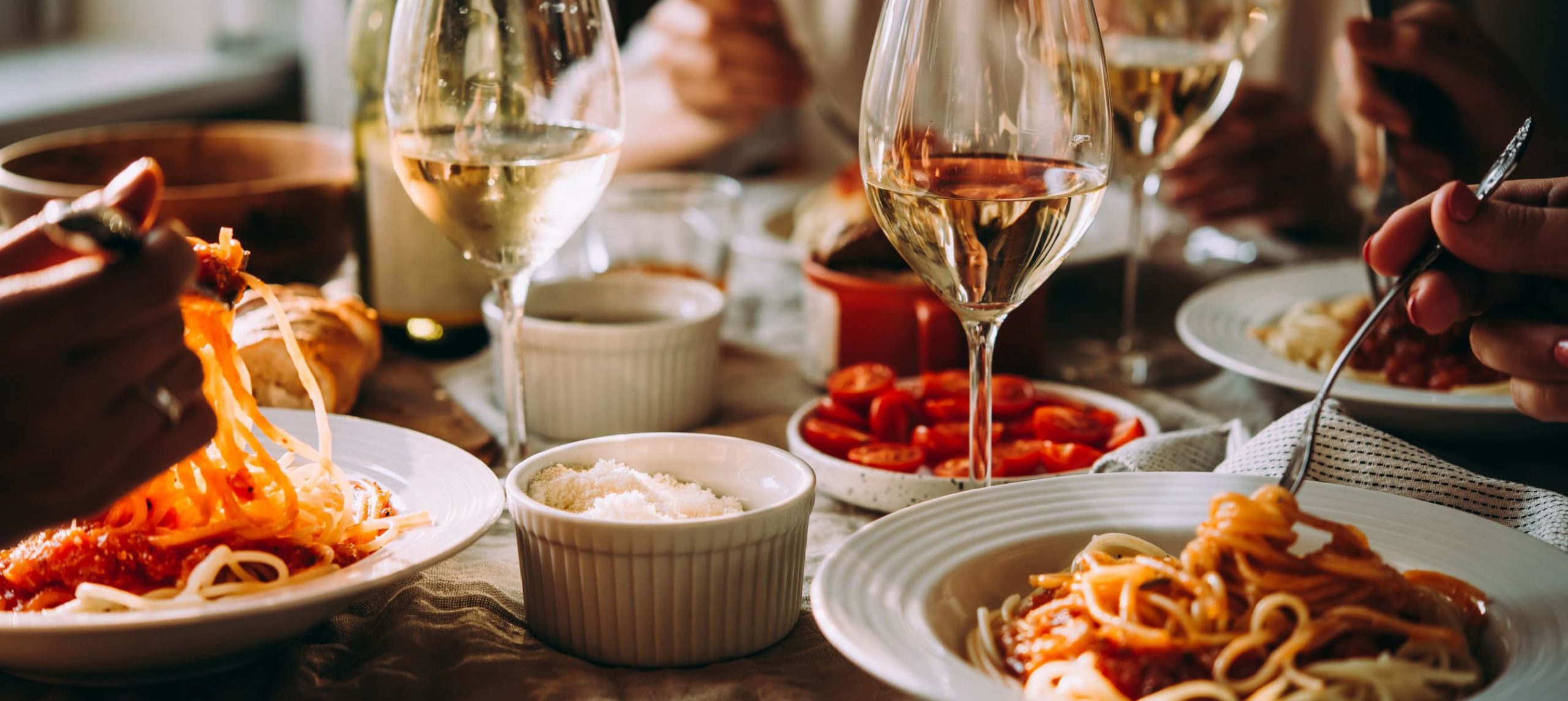 a table at a restaurant filled with food