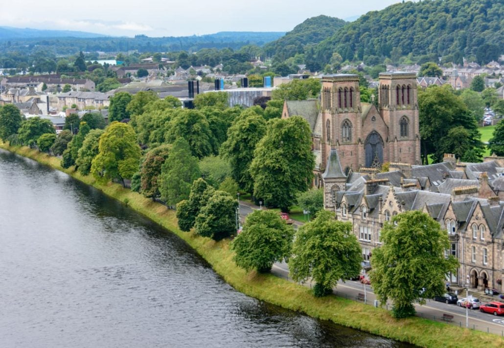 View of Inverness, Scotland, United Kingdom from above featuring St. Andrew's Cathedral and the River Ness.