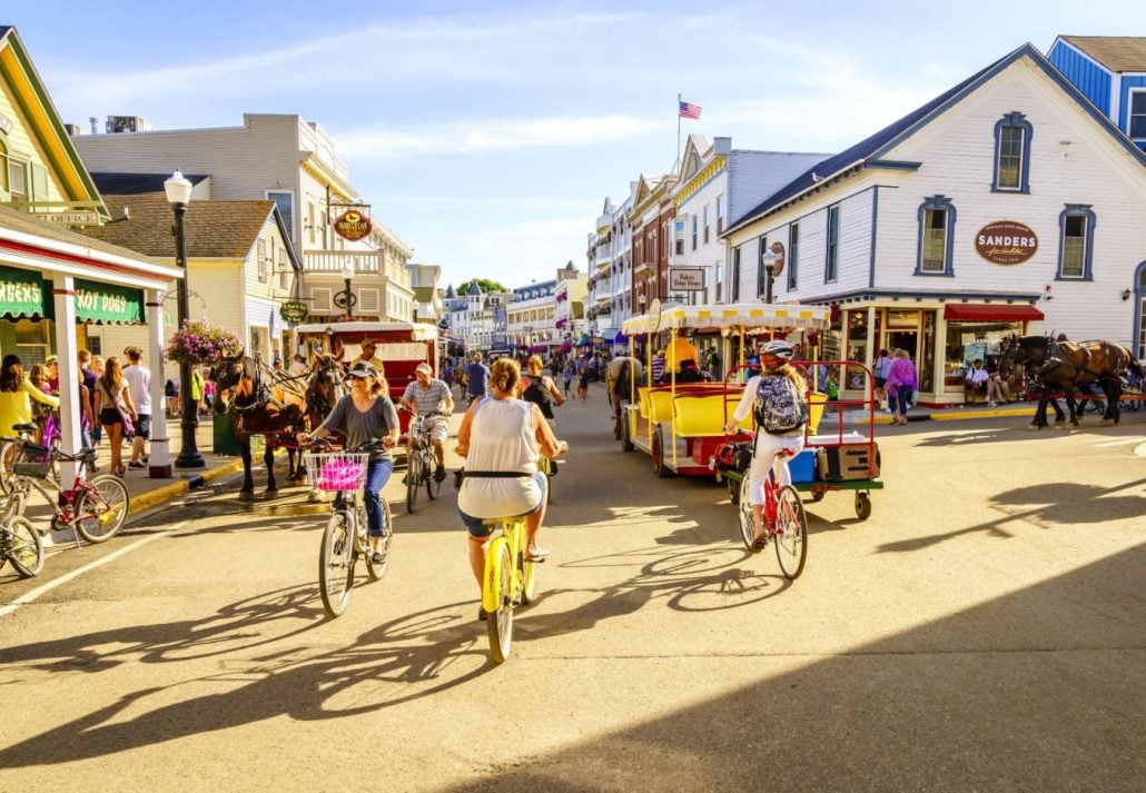 People biking in Mackinac Island, Michigan, USA.