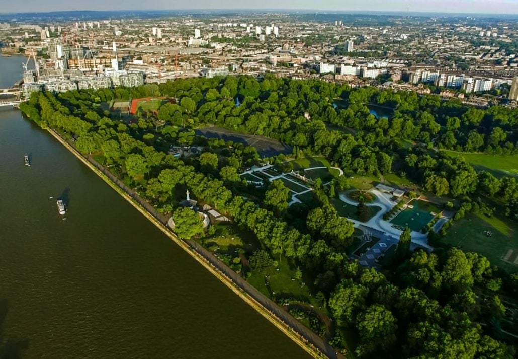 Aerial View Photo of Battersea Park feat. River Thames and Chelsea Bridge in London, England.