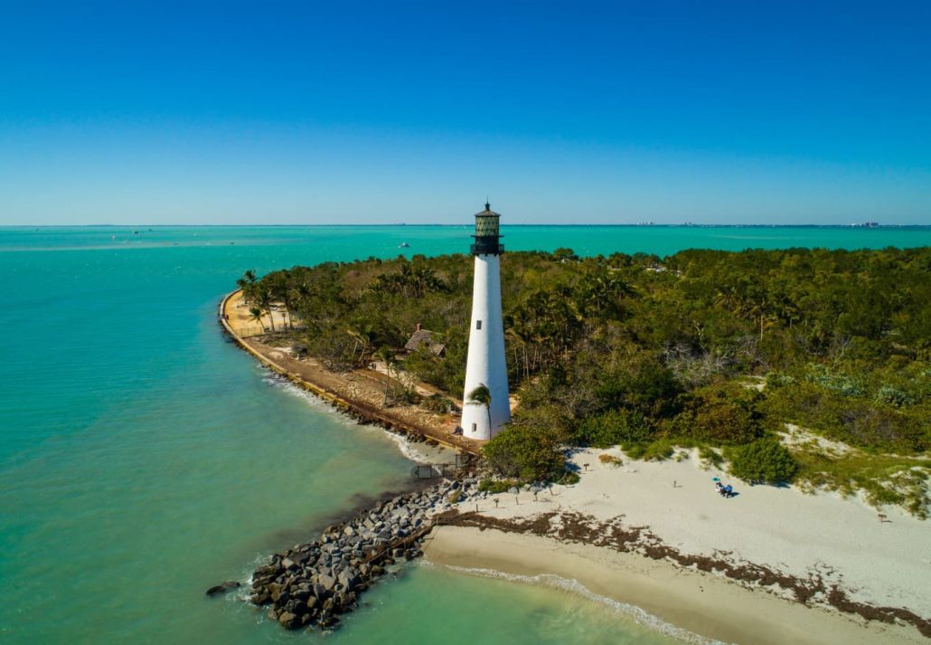 things-to-do-in-miami-bill-baggs-cape-florida-state-park | CuddlyNest Travel Blog Aerial image of the Cape Florida lighthouse Miami Florida, USA.
