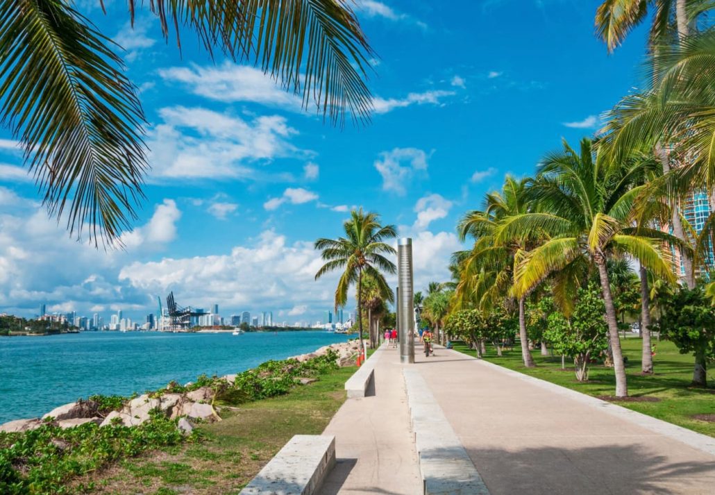 things-to-do-in-miami-south-pointe-park | CuddlyNest Travel Blog Walkway in a the beautiful park South Pointe in Miami Beach, Florida, USA.