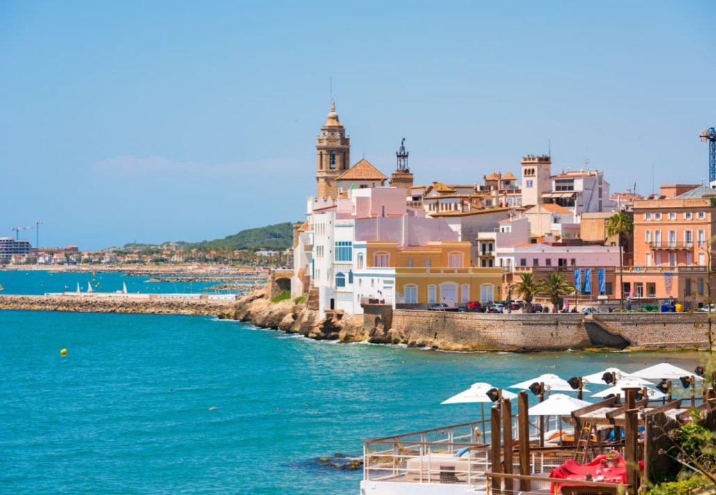 View of the historical center and the church of Sant Bartomeu and Santa Tecla in Sitges, Spain.