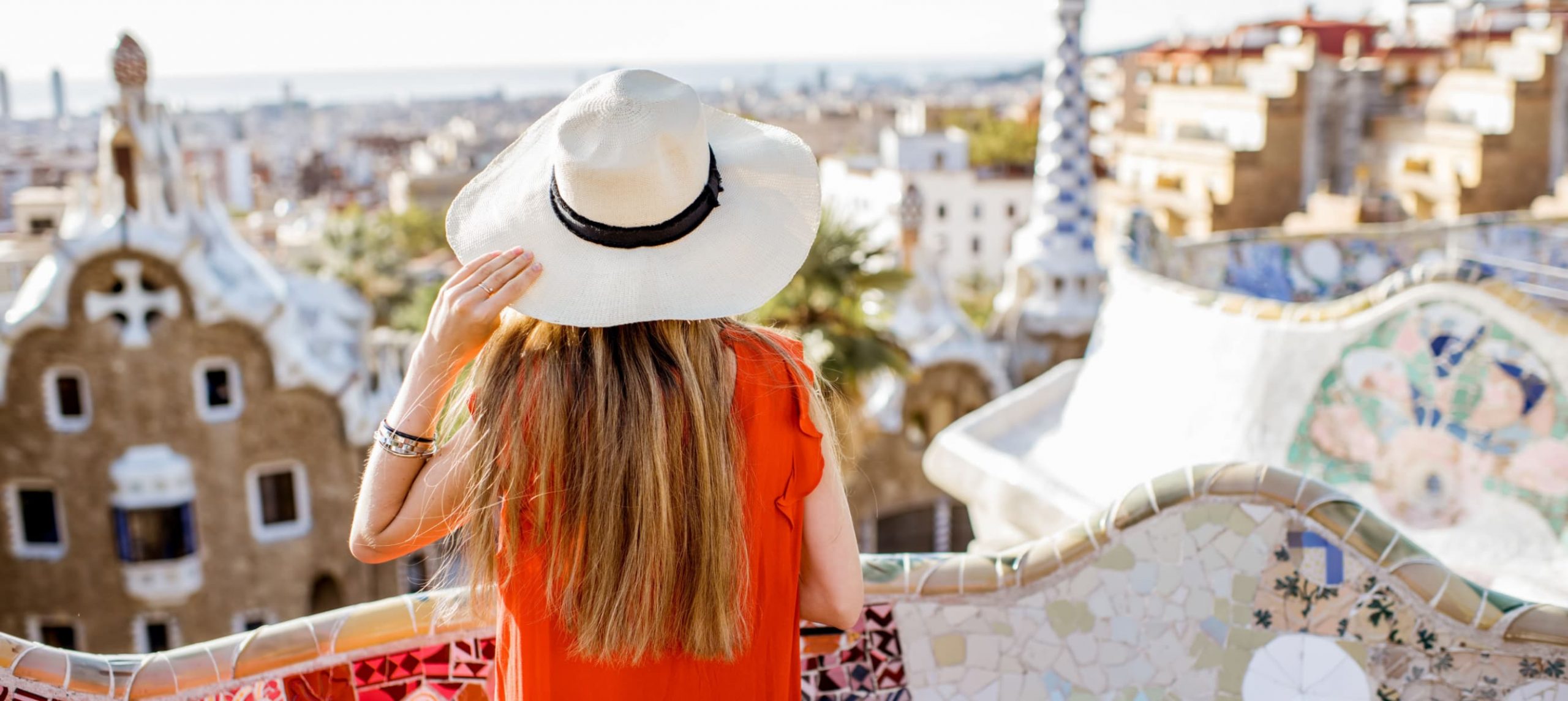 Young woman tourist in Park Güell, Barcelona.