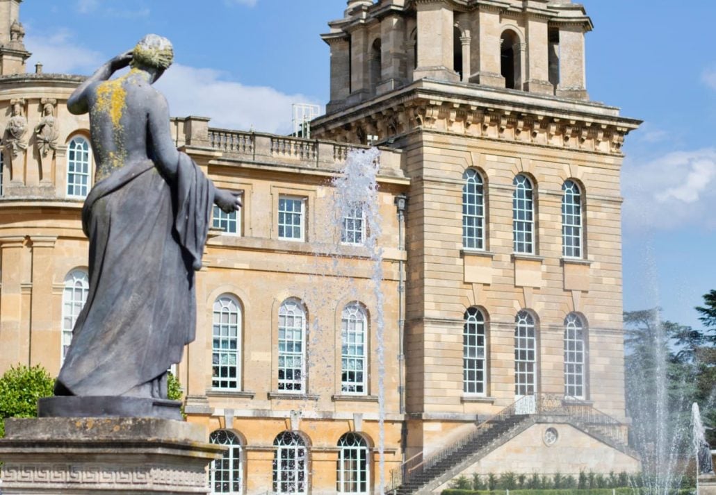 a statue in front of Blenheim Palace