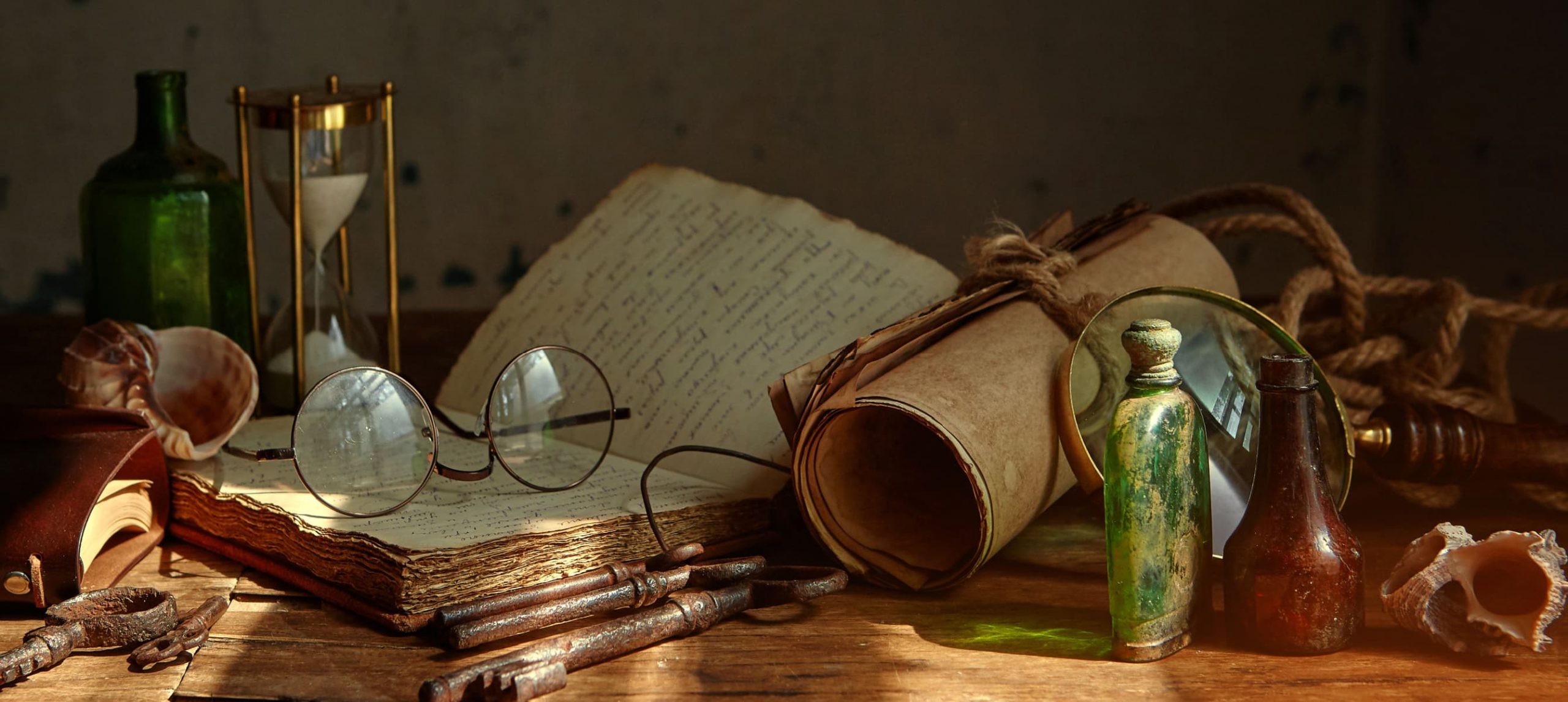 wizard's table full of notes and wizarding tools