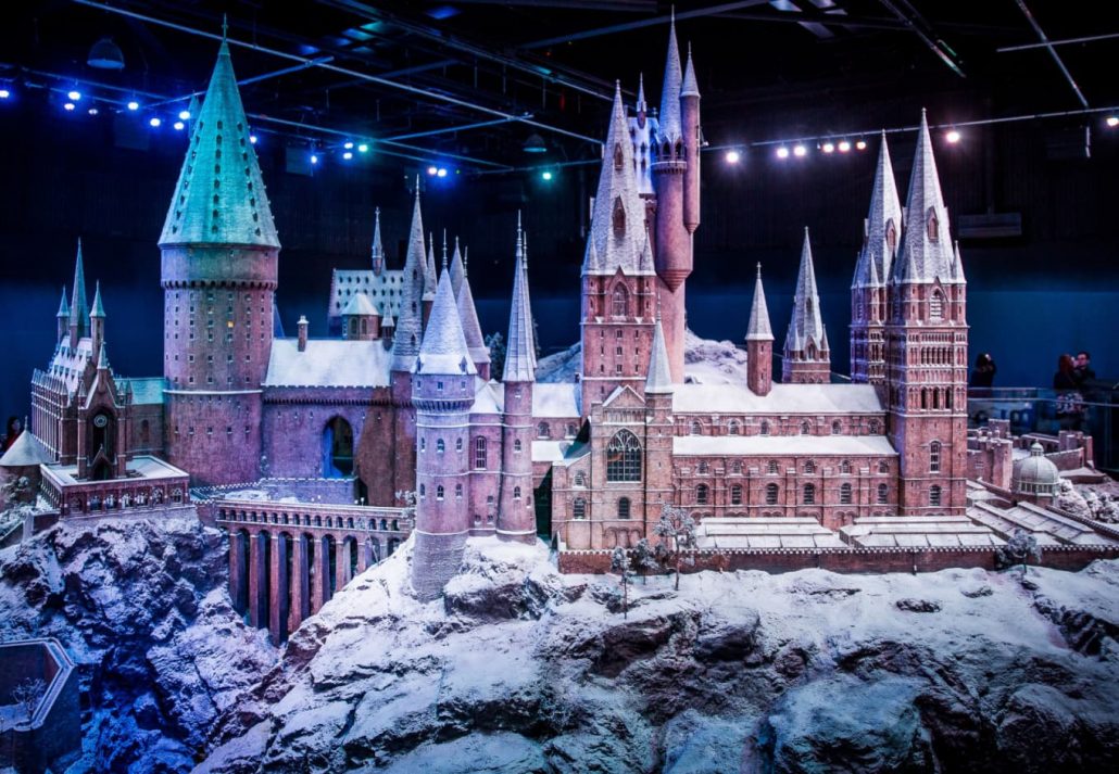 Things to do in London in winter - a snow-cowered castle at Hogwarts In The Snow