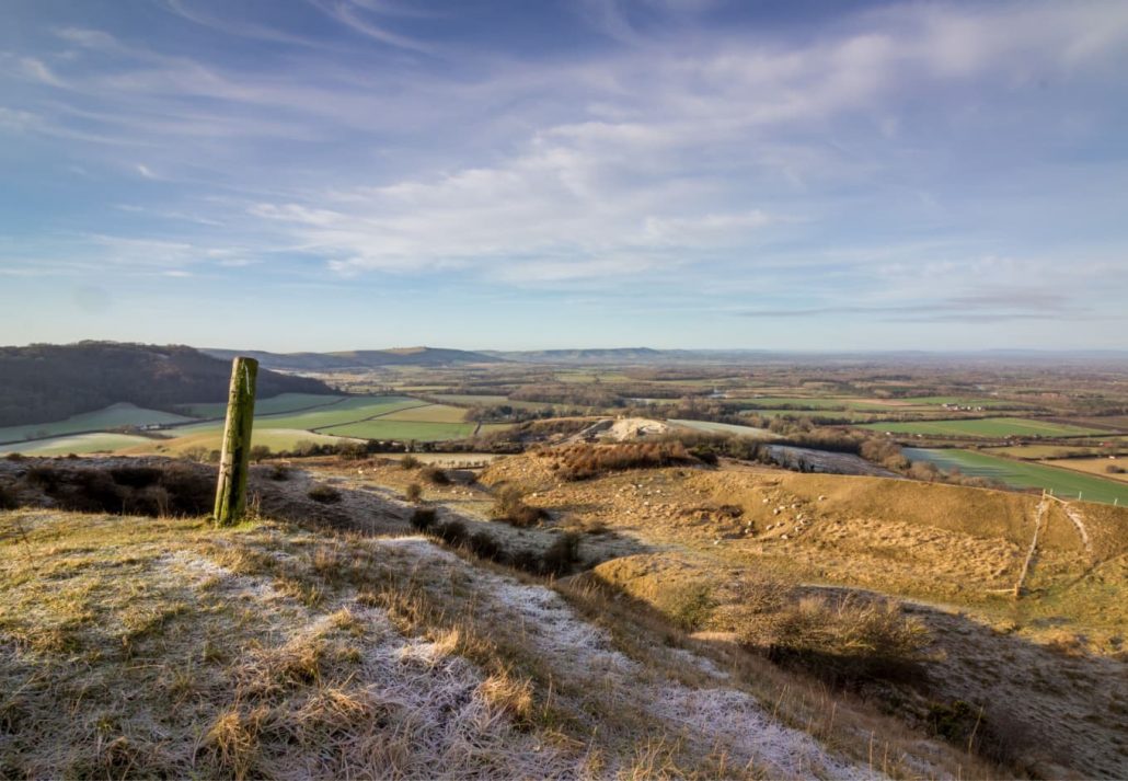 Things to do in London in winter - snow-covered hills at South Downs National Park
