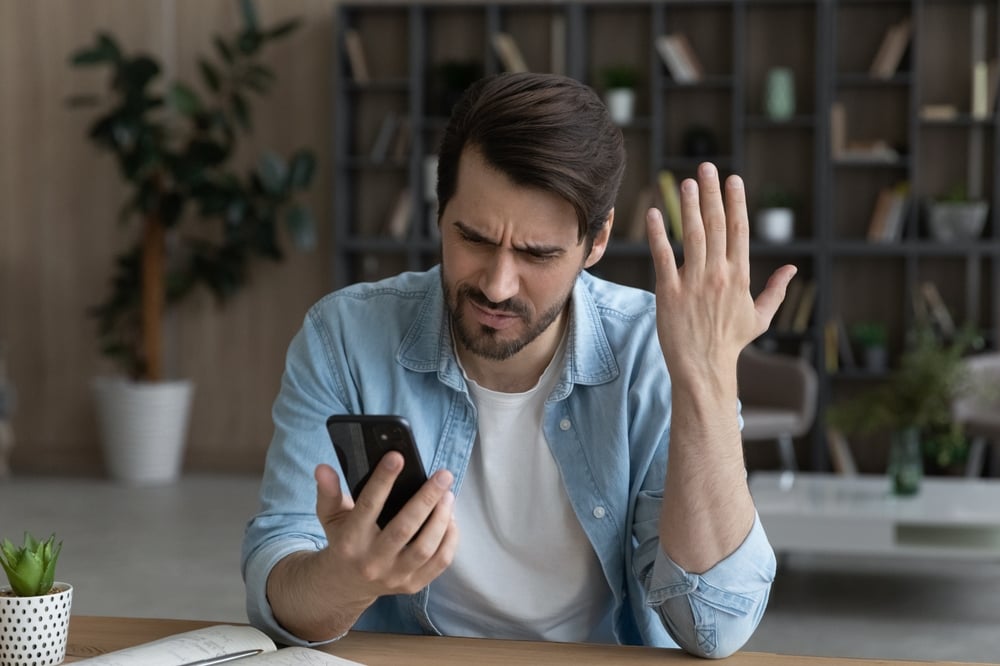 TelephoneProblemUpsetAngryMillennialMaleFeelOutragedByBad | CuddlyNest Travel Blog