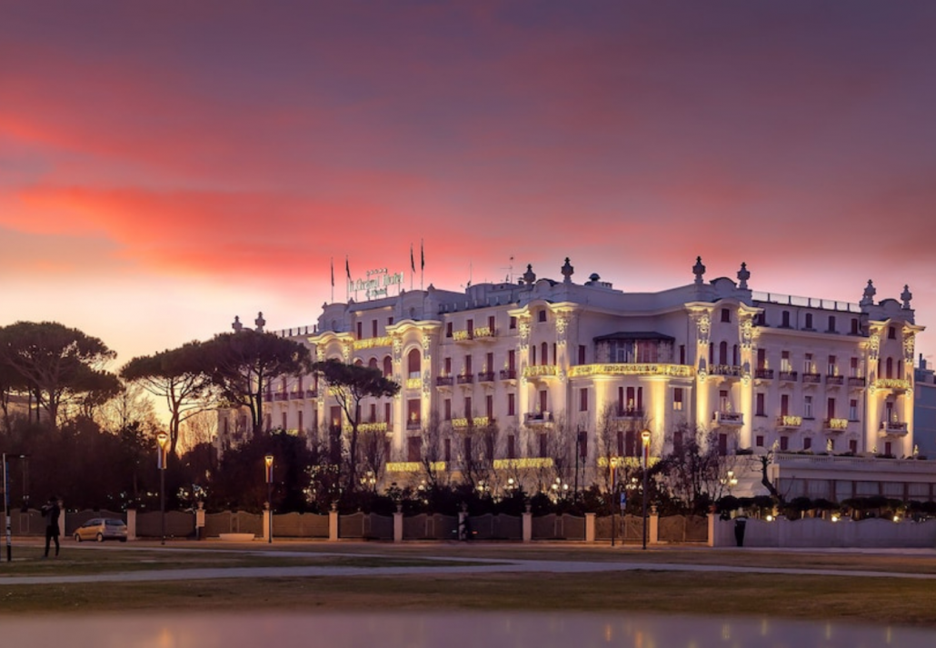 Exterior sunset view of the Grand Hotel Rimini