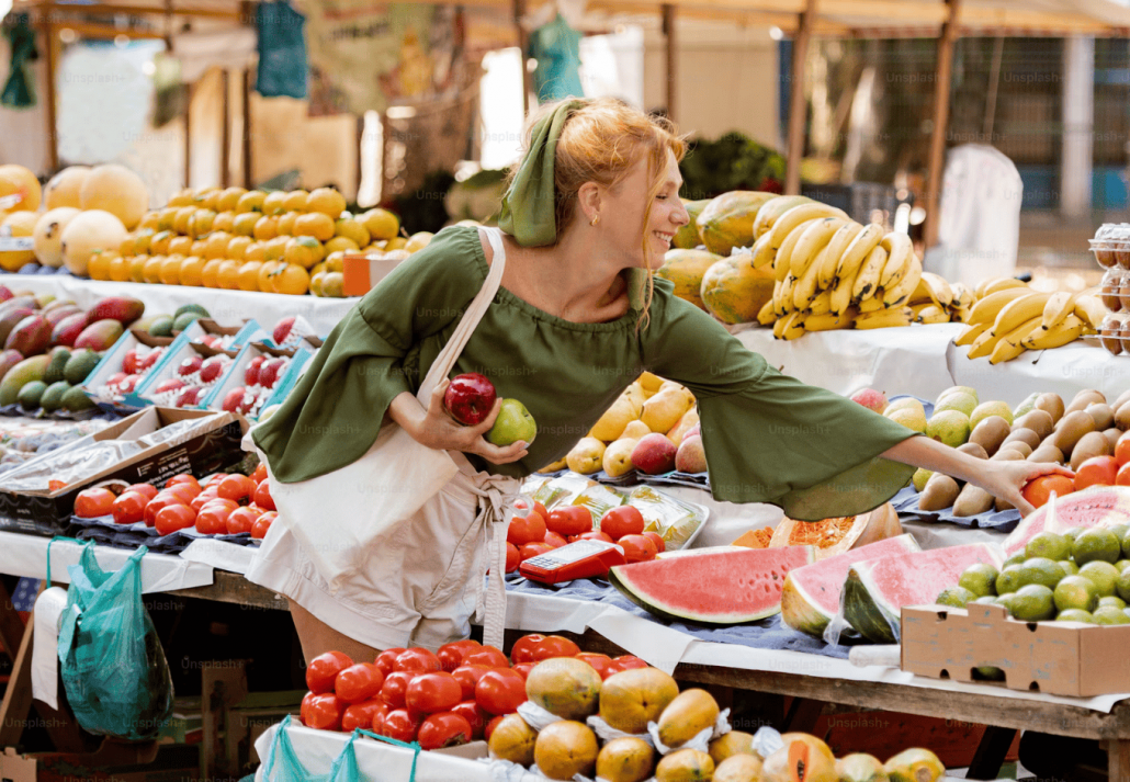 A Woman Shopping for local produce in Italian Market. things to do in monza