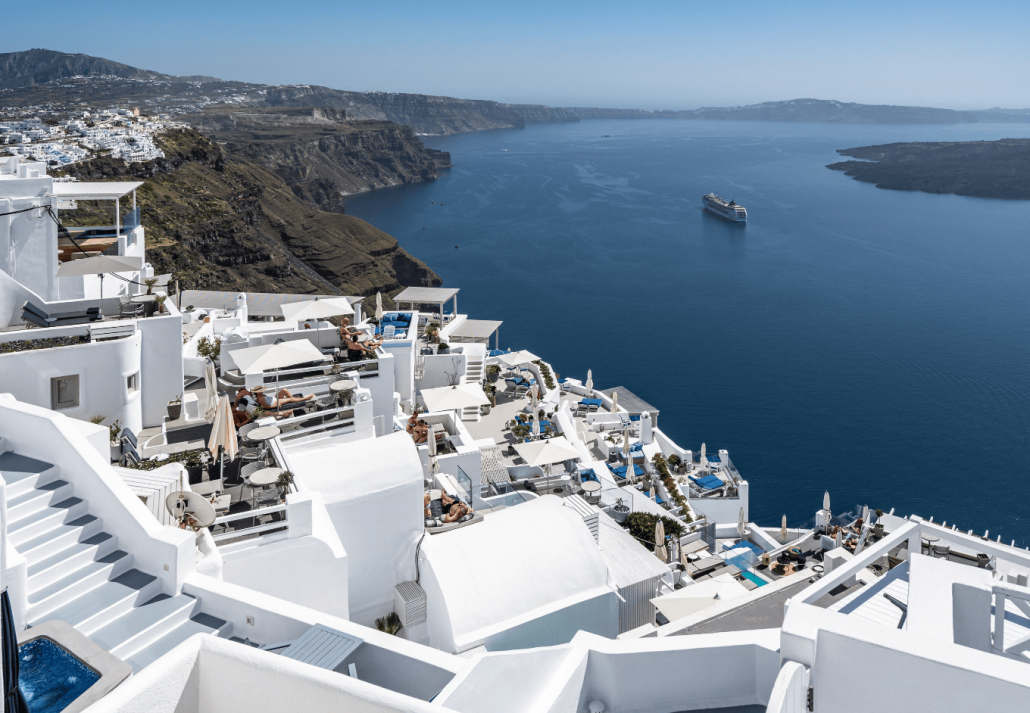 Typical white washed greek buildings in Santorini overseeing the caldera in Greece