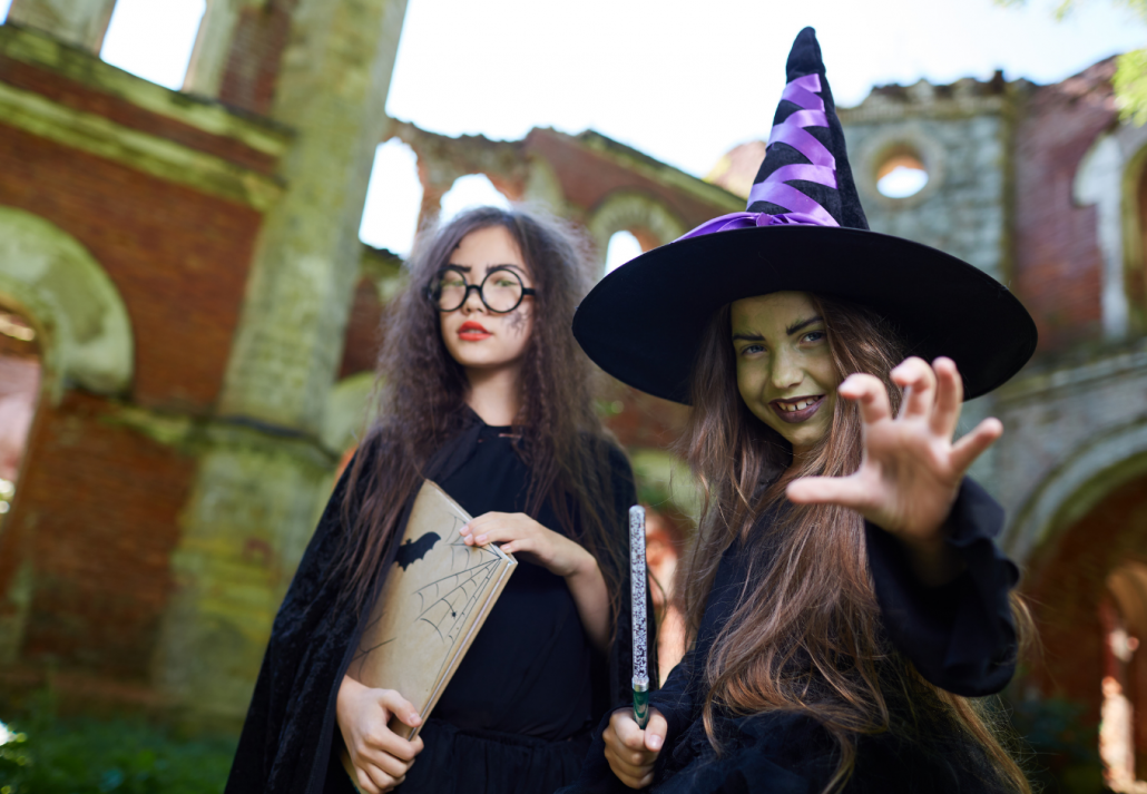 Two young females dressed up for Trick or Treat