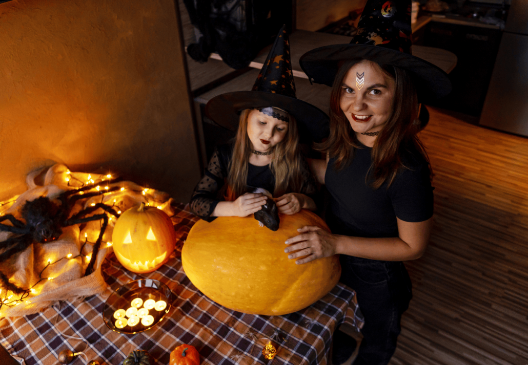 Mother daughter at a pumpkin carving workshop in Romania